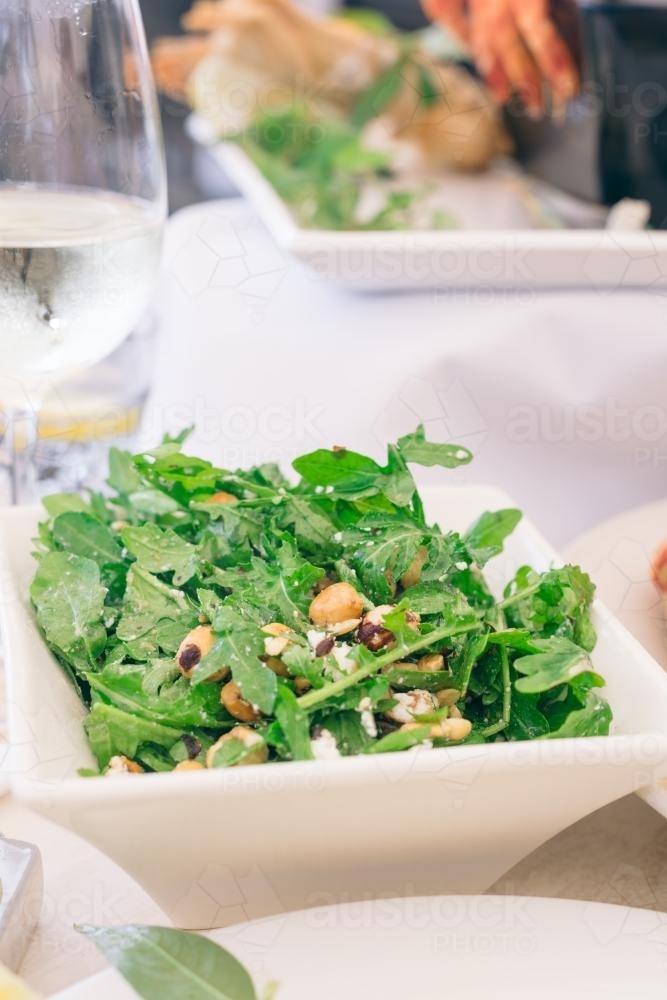 green salad with hazulnuts - Australian Stock Image