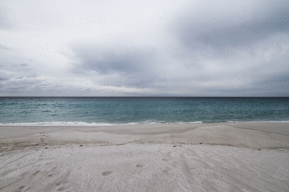 Grey moody sky at the beach - Australian Stock Image