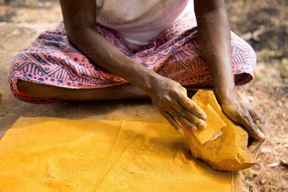 Grinding ochre - Australian Stock Image
