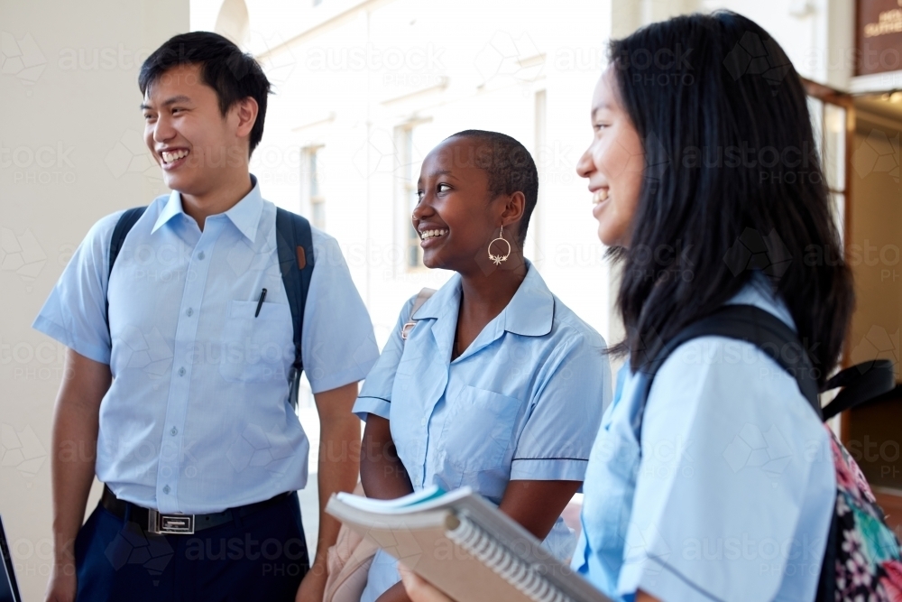 Group of High School friends laughing together - Australian Stock Image