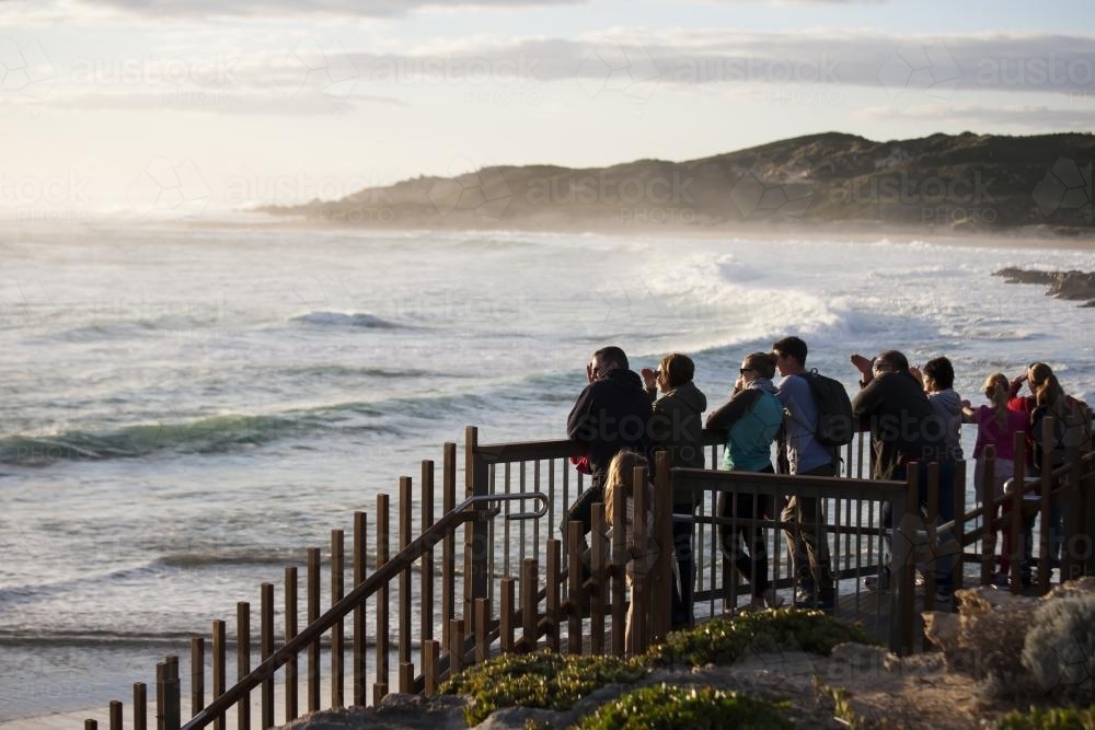 Group of people watching big swell at Margaret River - Australian Stock Image