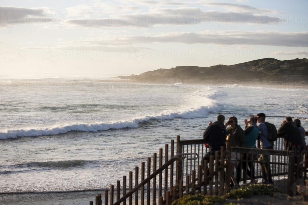 Group of people watching big swell at Margaret River - Australian Stock Image
