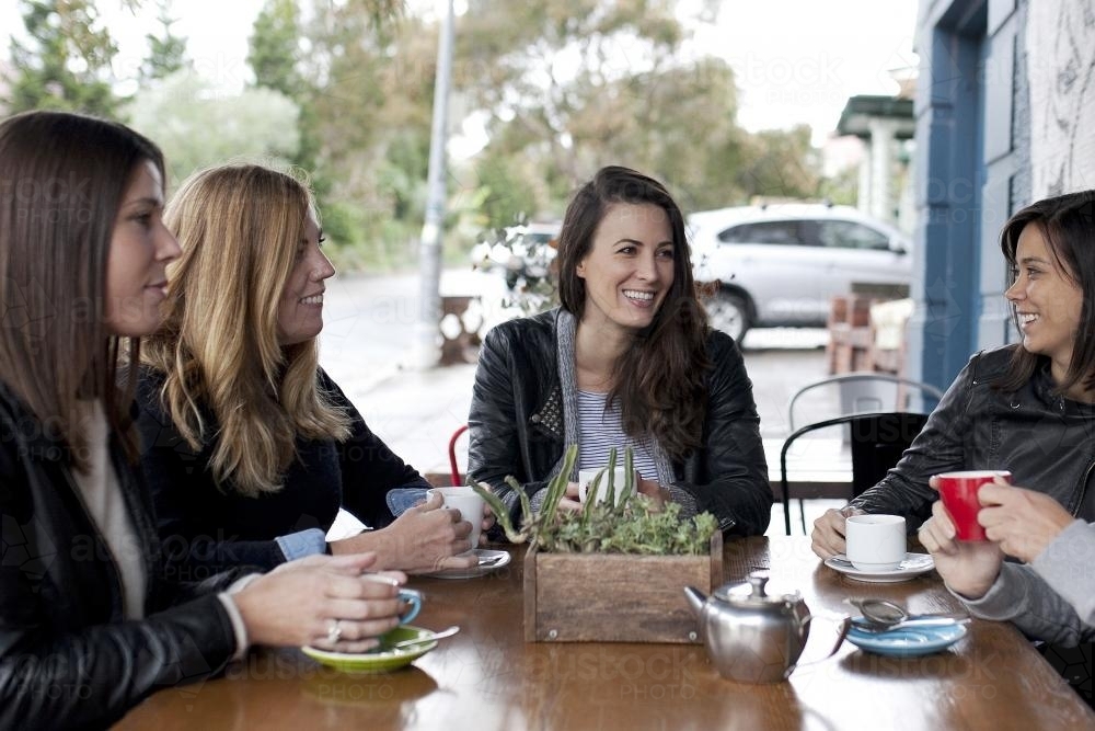Group of women having coffee at a cafe - Australian Stock Image