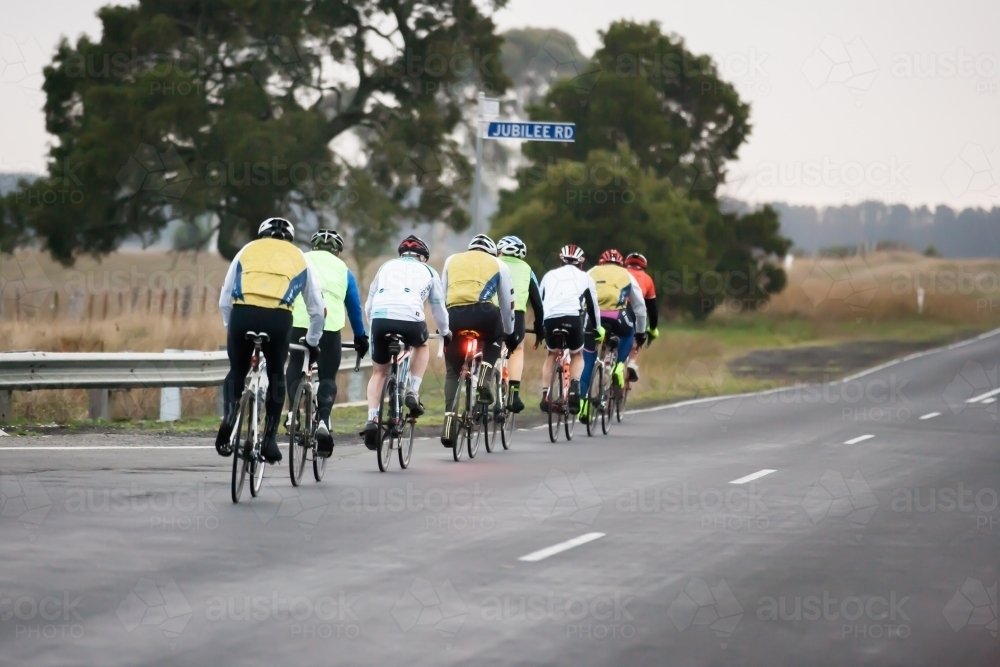 Single File Motorcycel Riding Image of Groups of cyclists riding in single file on a country road ...