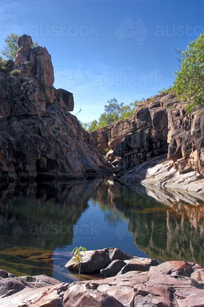 Gunlom Kakadu watering hole canyon with reflection - Australian Stock Image