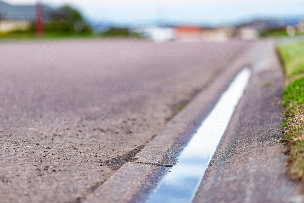 Image of Gutter on roadside with water sitting in it - drainage issues ...