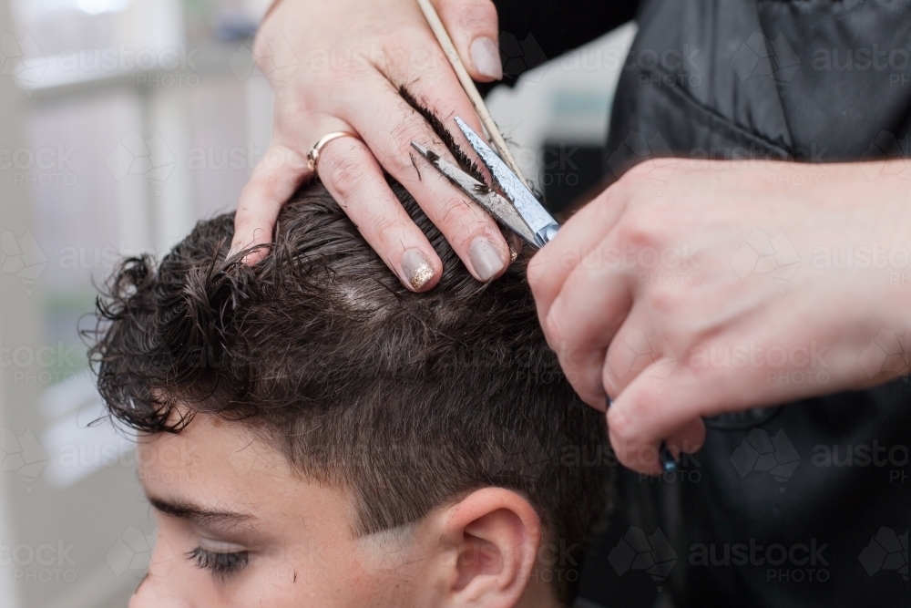 Image Of Hairdresser Cutting Teenage Boys Hair Austockphoto