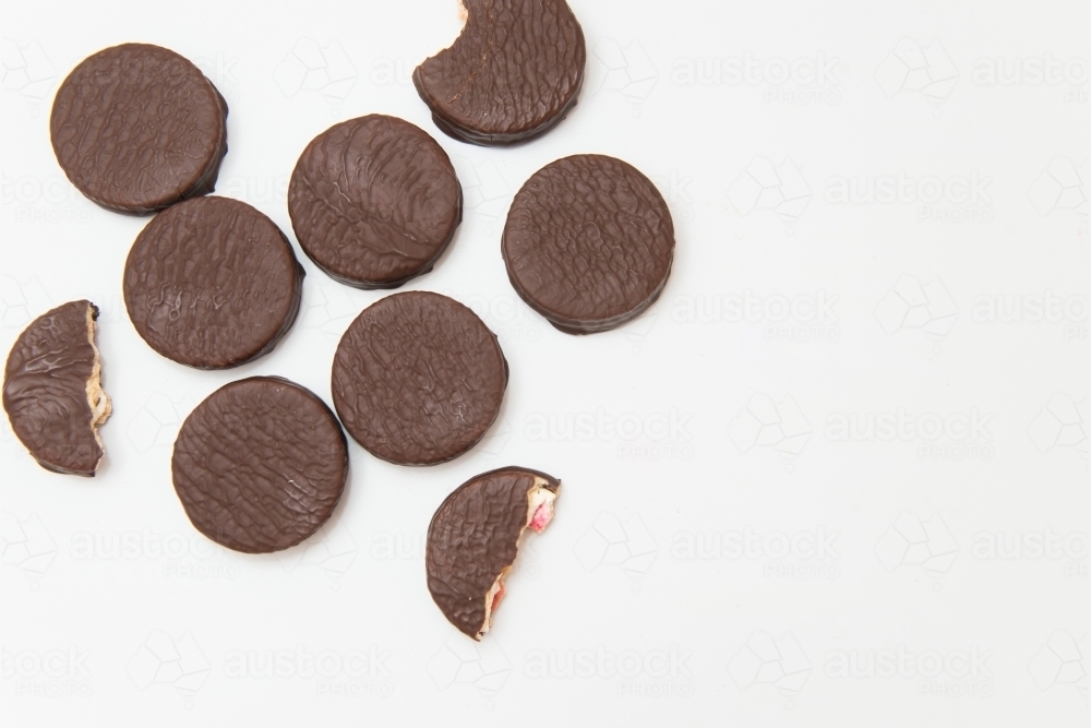 Half eaten chocolate biscuits - Australian Stock Image
