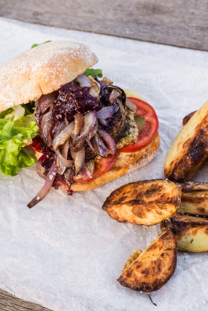 hamburger with potato wedges - Australian Stock Image