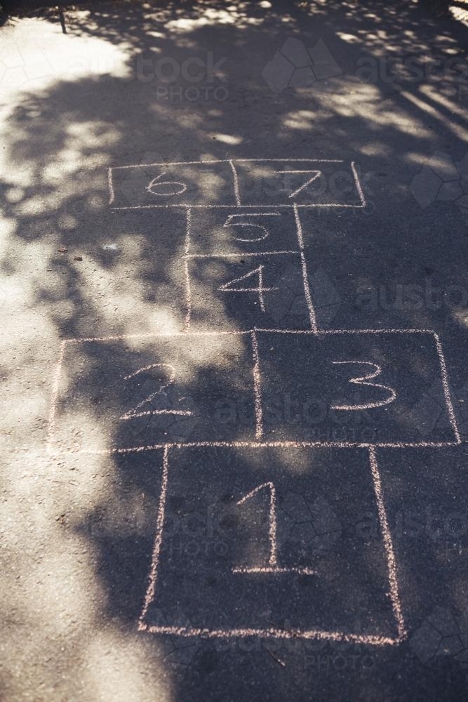 Image of Hand drawn hop scotch game on asphalt road playground ...