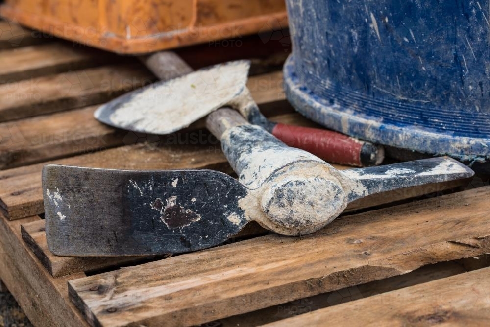 Hand tools lying on wooden pallet - Australian Stock Image
