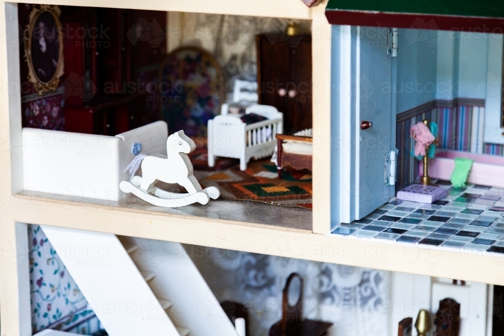 Handcrafted dolls house furniture for child to play with - Australian Stock Image