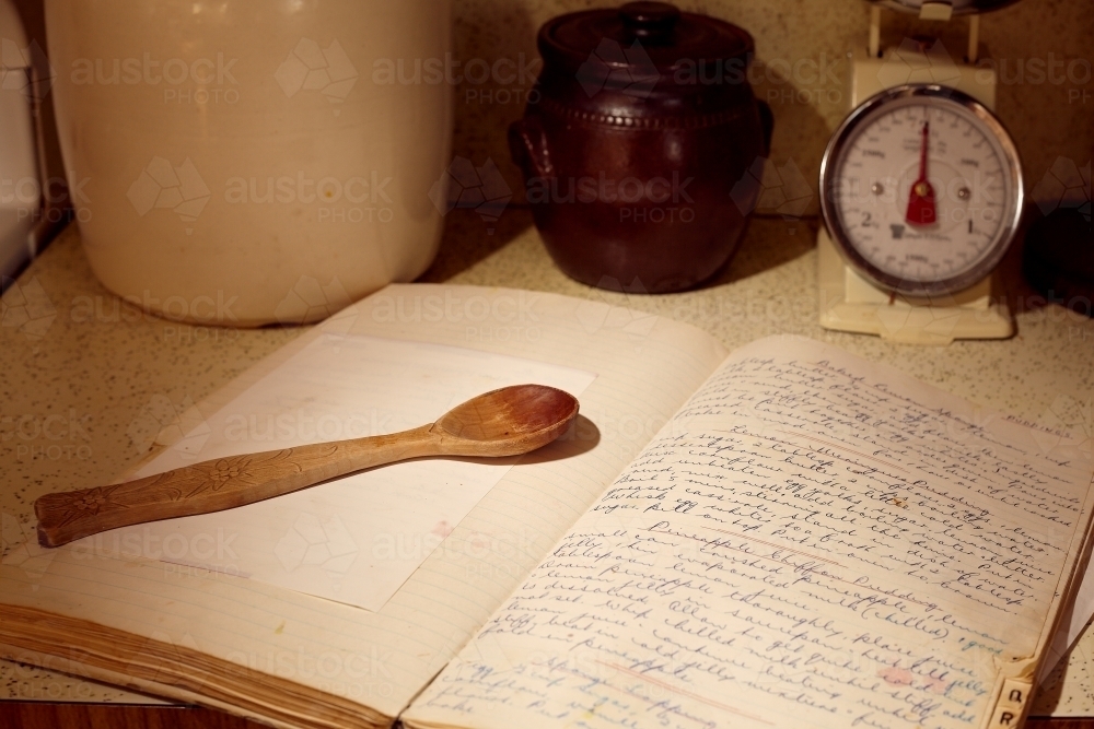 Handwritten cookbook & kitchen implements. - Australian Stock Image