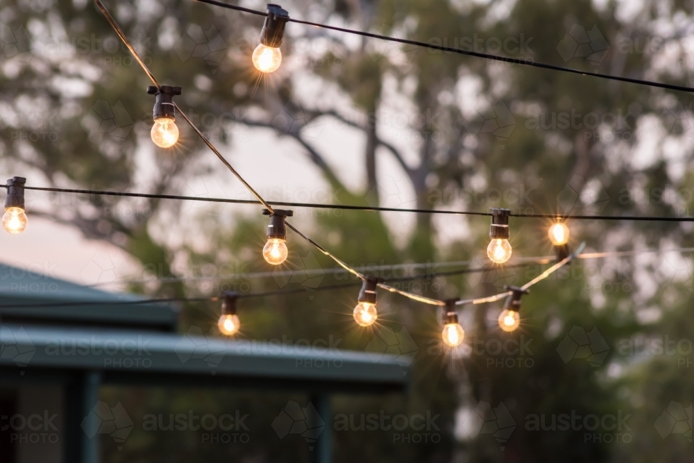 Hanging string lights outdoors - Australian Stock Image