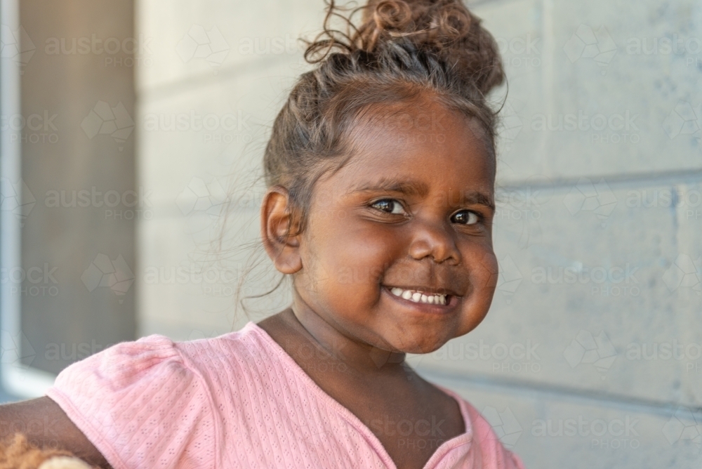 Happy Aboriginal 3 year old girl - Australian Stock Image