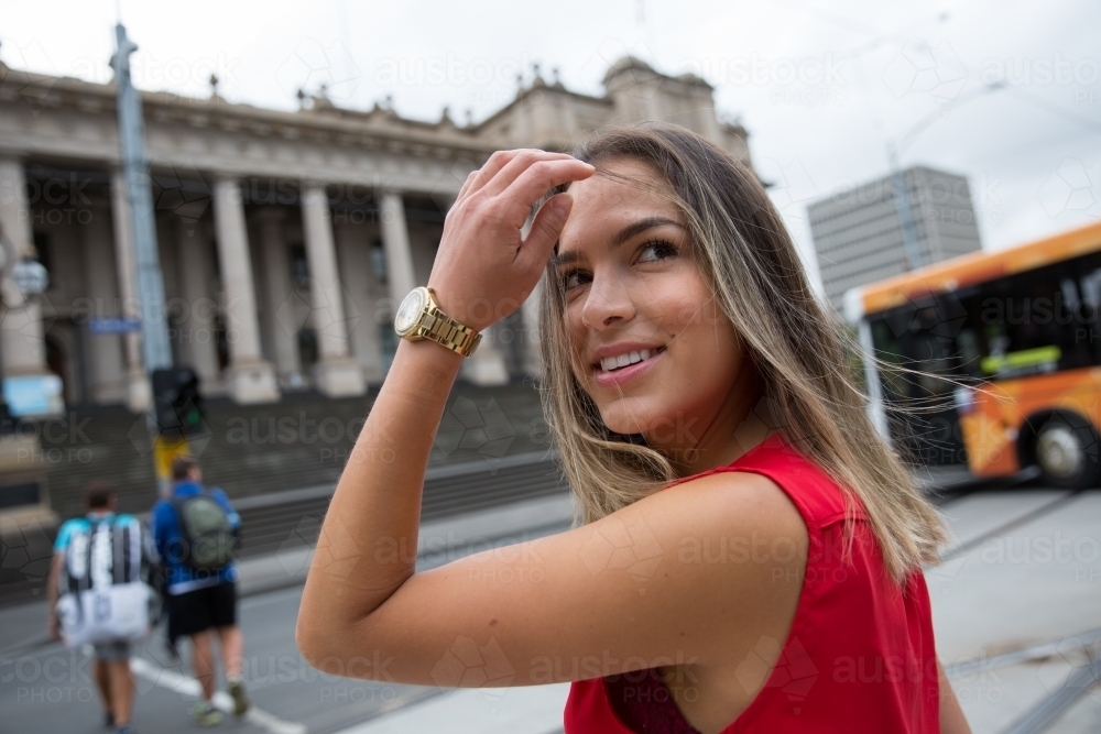 Happy Business Woman Crossing Spring Street - Australian Stock Image