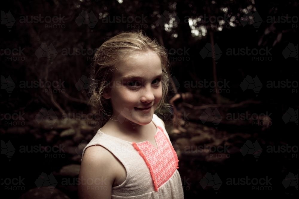 Happy girl at the creek - Australian Stock Image