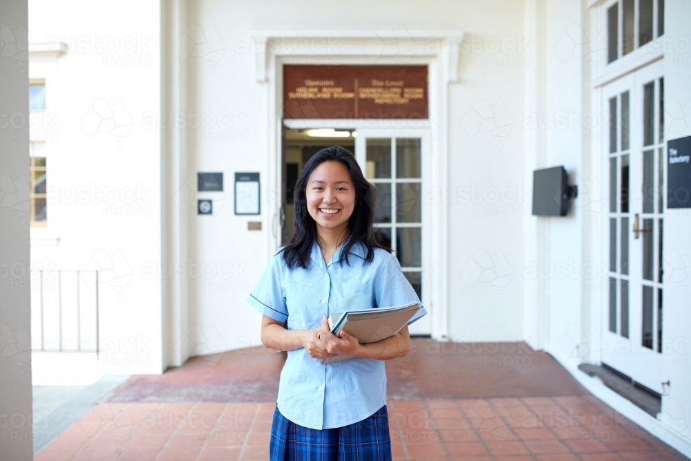 Happy High School student on-campus - Australian Stock Image