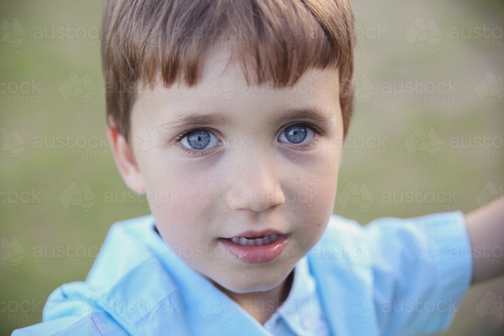 Happy little boy in the park - Australian Stock Image