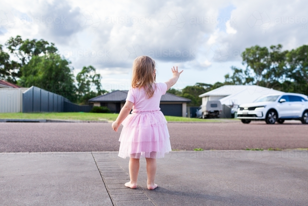 Goodbye Neighbour Image of Happy little girl on driveway waving goodbye to neighbours ...