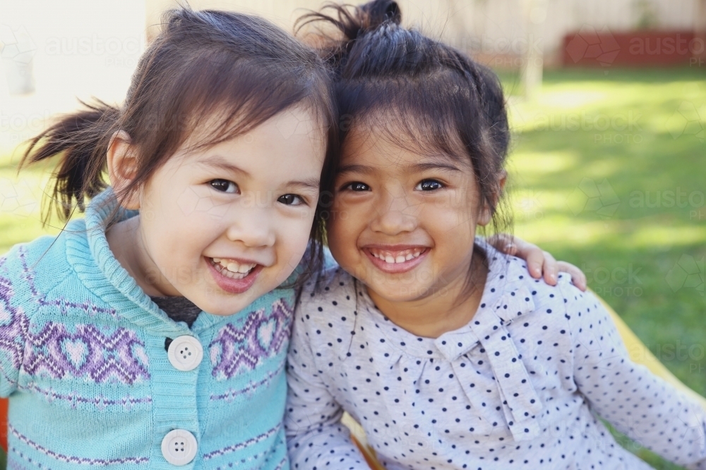 Happy little multicultural young girls - Australian Stock Image