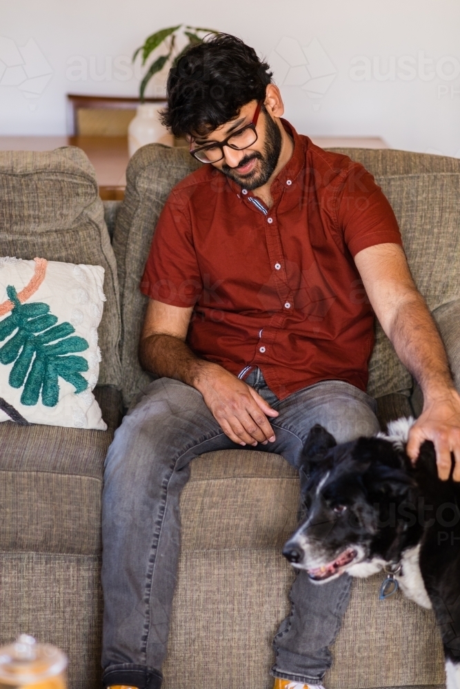 happy man with his cattle dog - Australian Stock Image