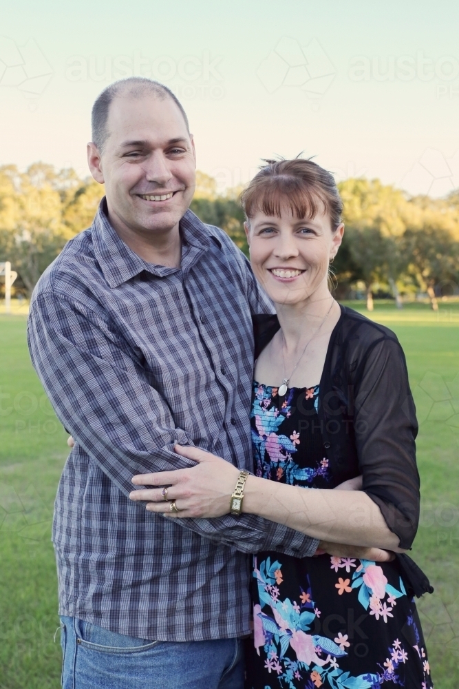 Happy mature couple in the park - Australian Stock Image