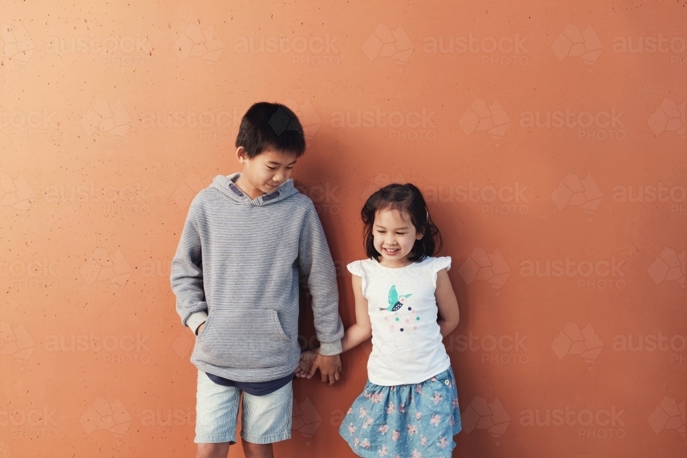 Happy multicultural boy and girl - Australian Stock Image