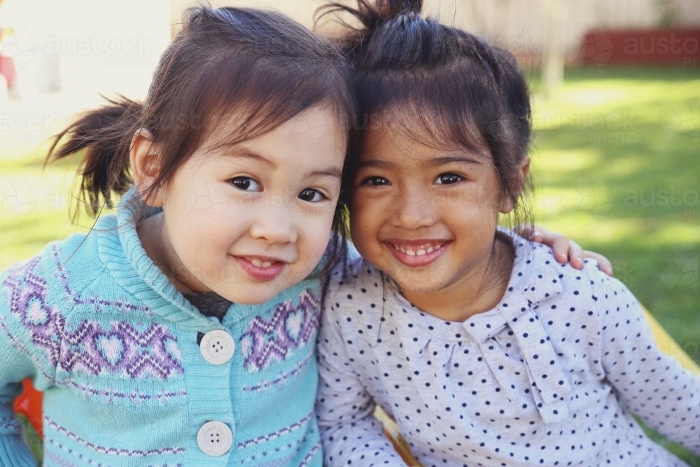 Happy multicultural young little girls - Australian Stock Image