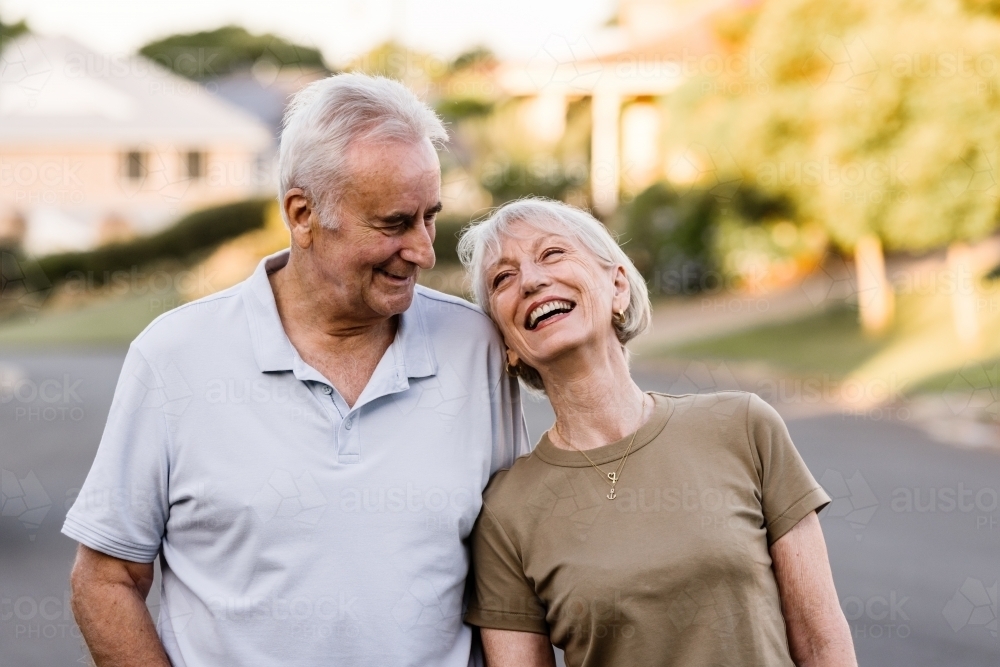 happy senior couple outdoors - Australian Stock Image
