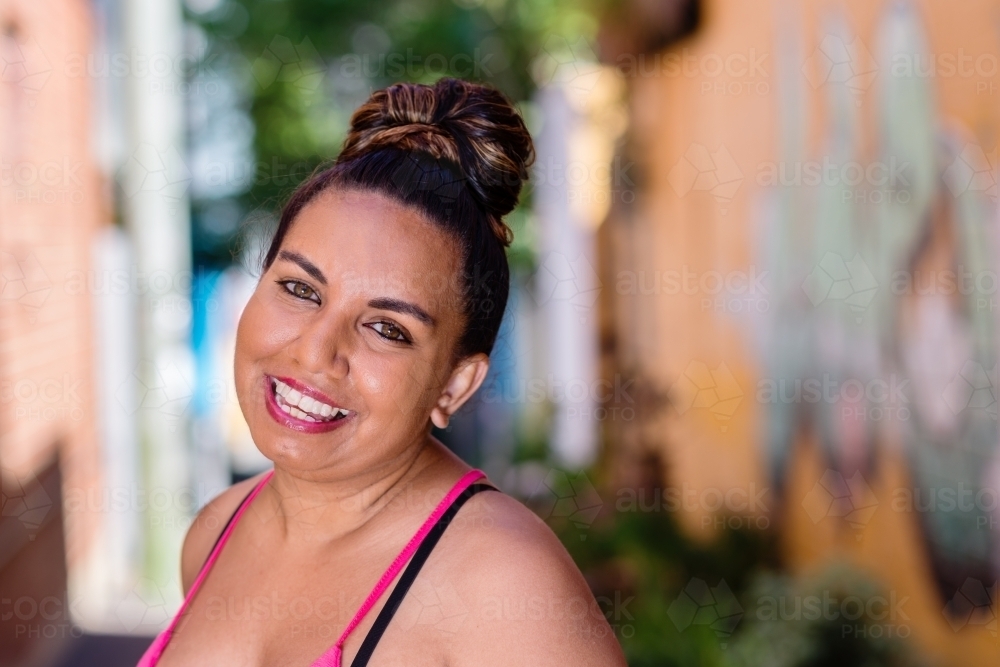 happy smiling young aboriginal woman - Australian Stock Image