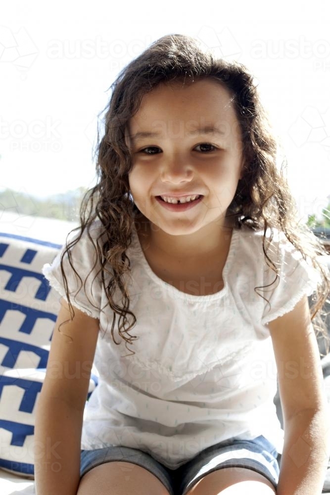 Happy smiling young girl - Australian Stock Image