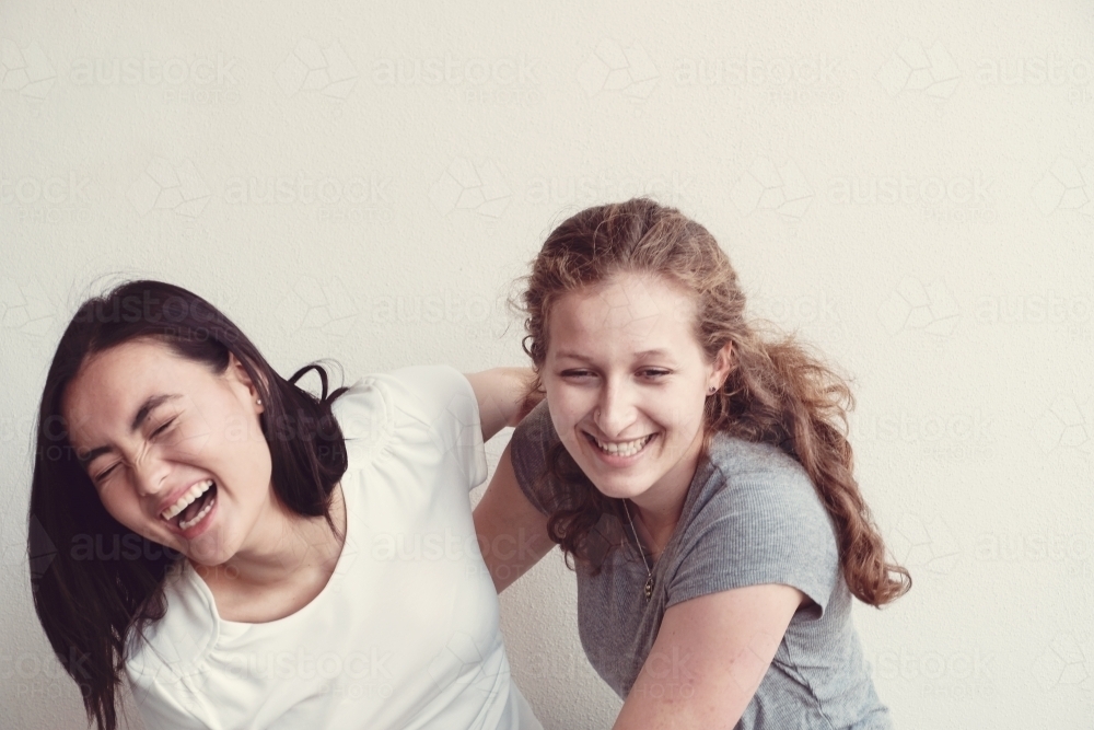 Happy students girl friends - Australian Stock Image