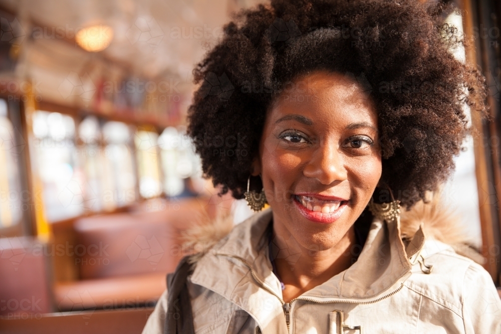 Happy Tourist on Melbourne Tram - Australian Stock Image