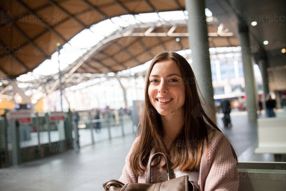 Happy Train Traveler at the Station - Australian Stock Image