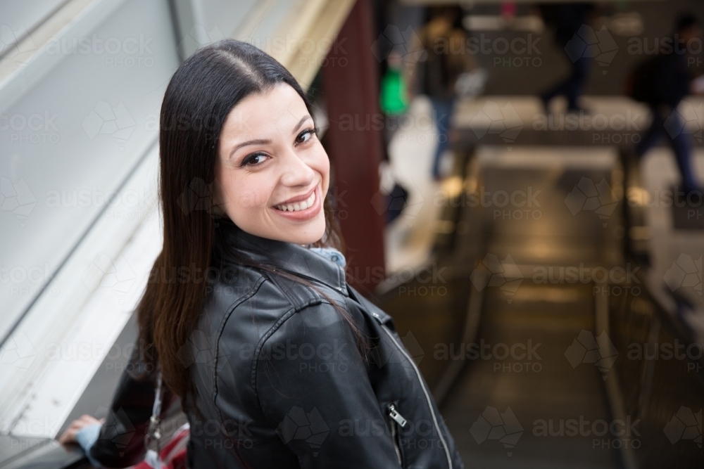 Happy woman, leaving the Station Platform - Australian Stock Image