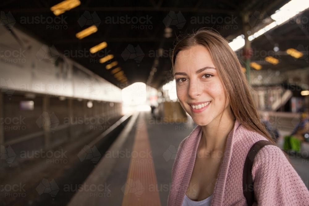 Happy Woman Waiting for the Train - Australian Stock Image