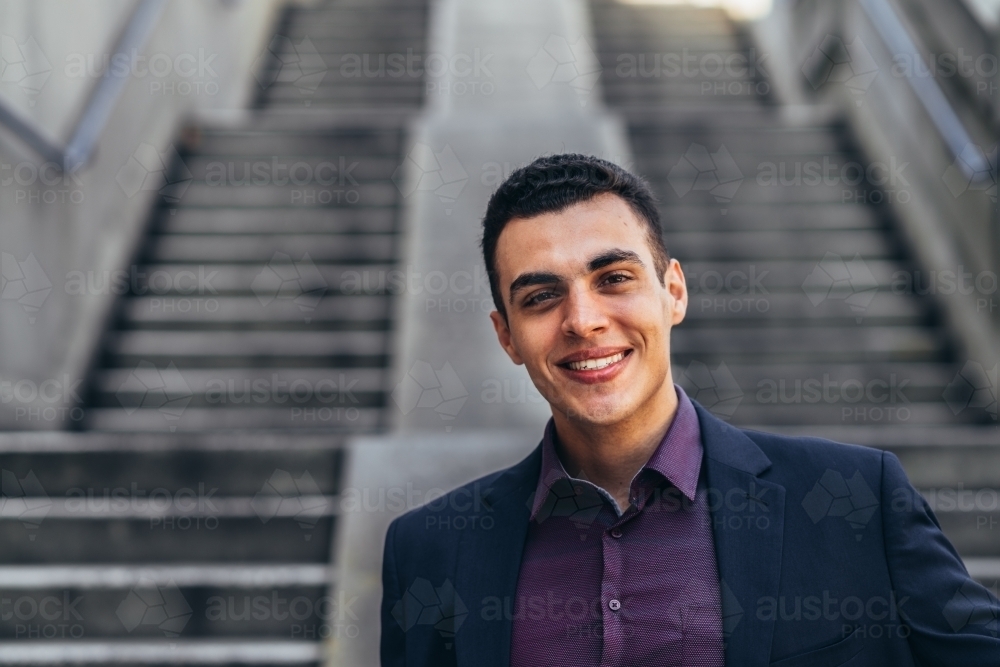 happy young man smiling - Australian Stock Image