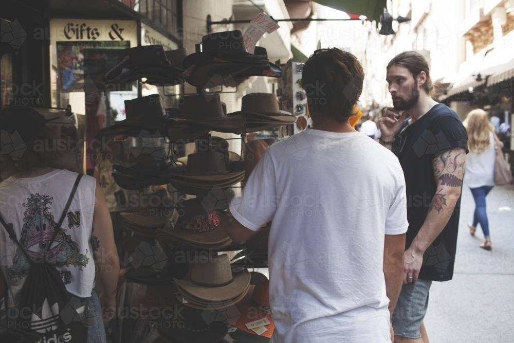 Hat shopping on the streets of Perth - Australian Stock Image