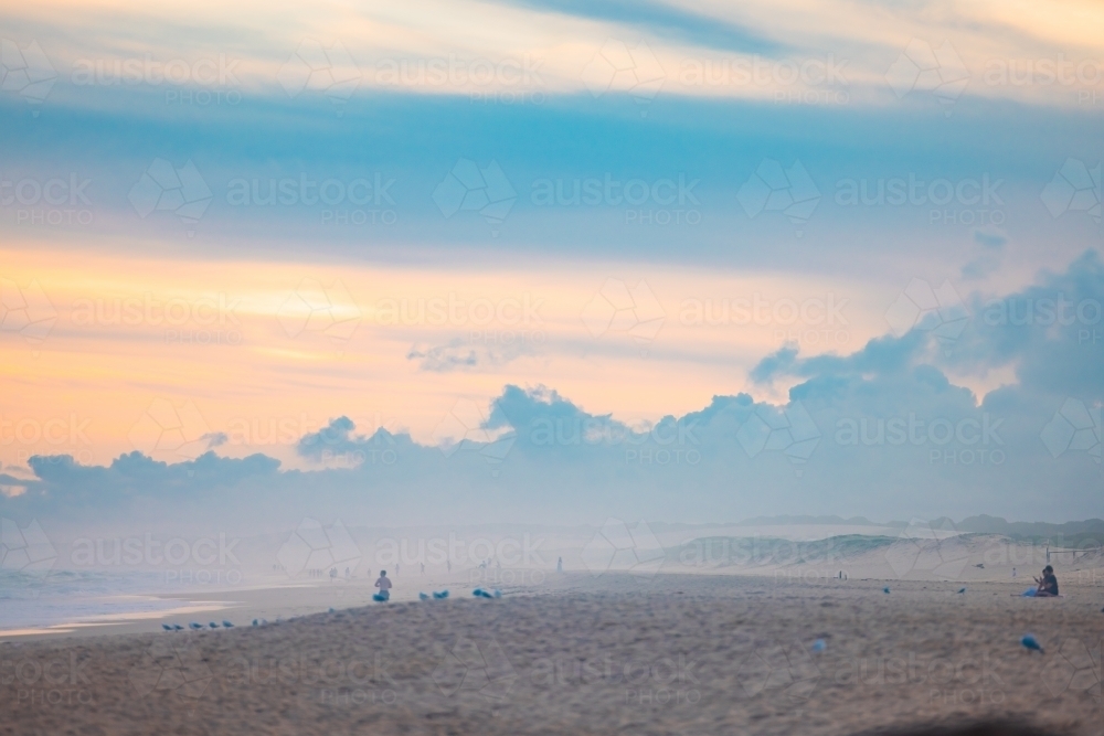 Hazy sunset sky over Redhead Beach, Newcastle NSW - Australian Stock Image
