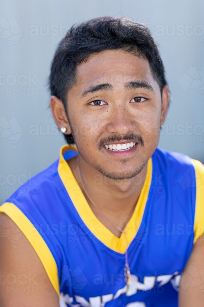 head and shoulders of teenage boy looking at camera - Australian Stock Image