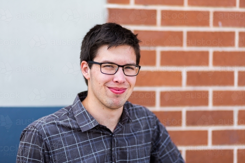 Head shot portrait of happy smiling person - Australian Stock Image