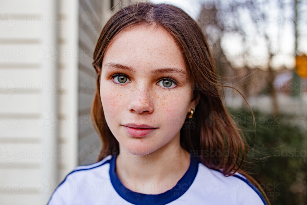 Image of Headshot of young preteen girl with long hair outside the ...
