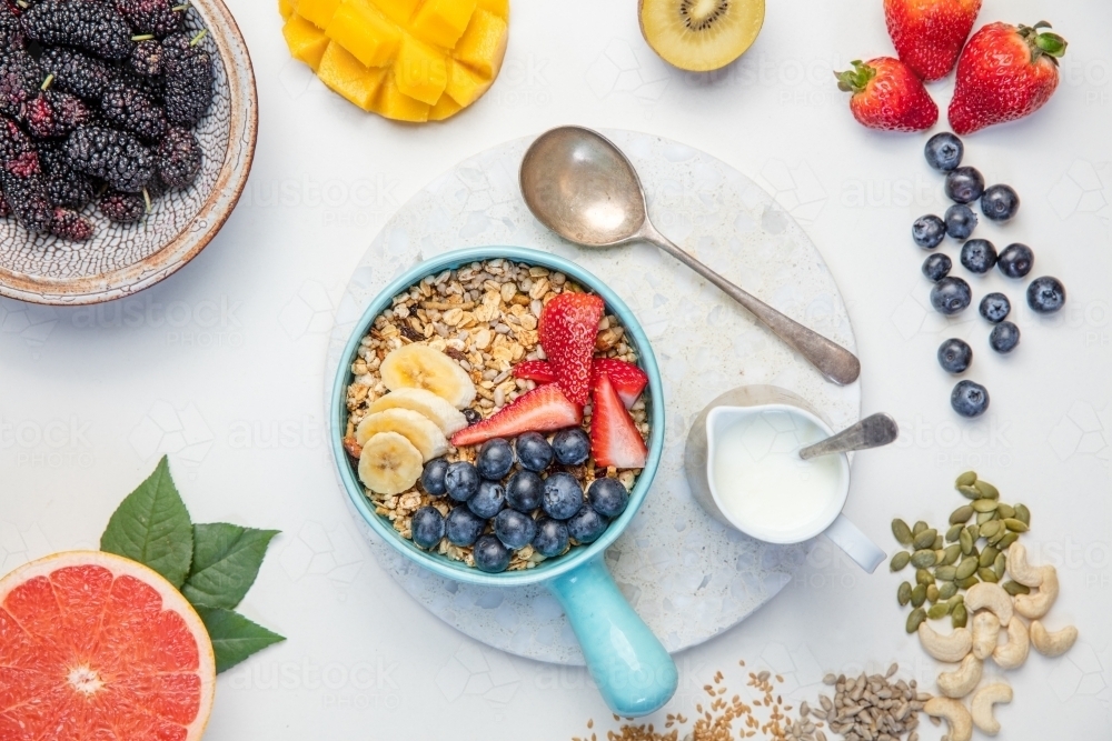 Healthy breakfast with wholegrain cereal and fruit - Australian Stock Image