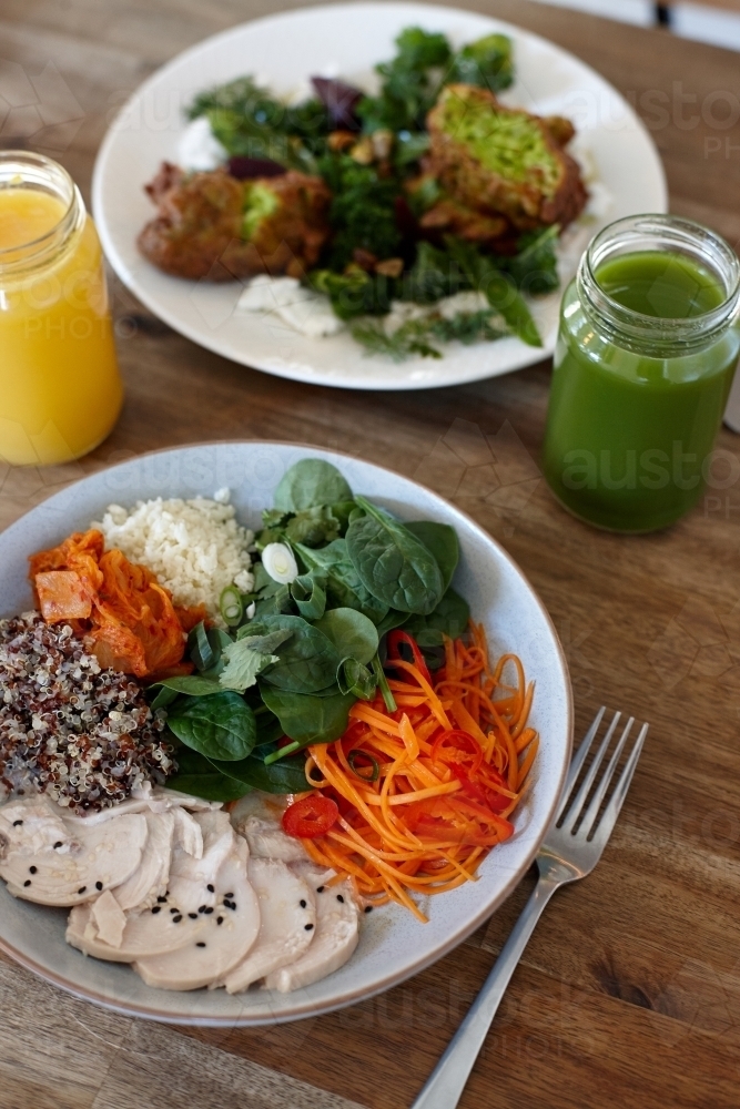 Healthy meals and juices on table - Australian Stock Image