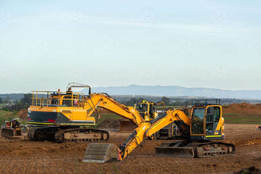 heavy earthmoving machinery on earthworks construction site for Singleton Bypass - Australian Stock Image