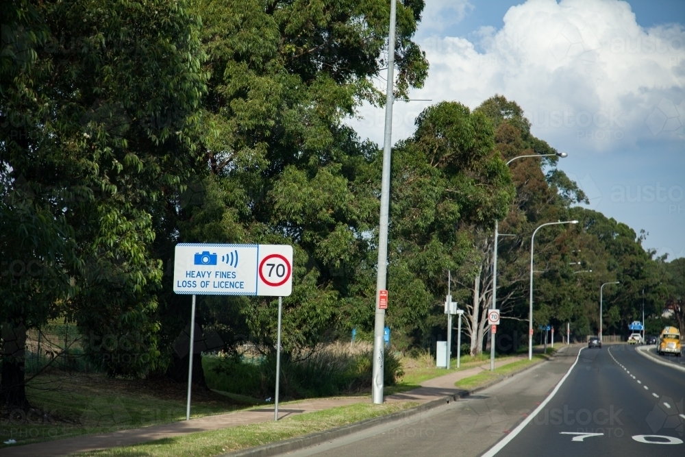 Heavy fines loss of license speed camera warning in 70 zone - Australian Stock Image