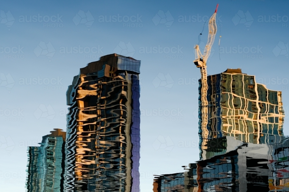 High Rise Buildings reflected in Victoria Harbour - Australian Stock Image