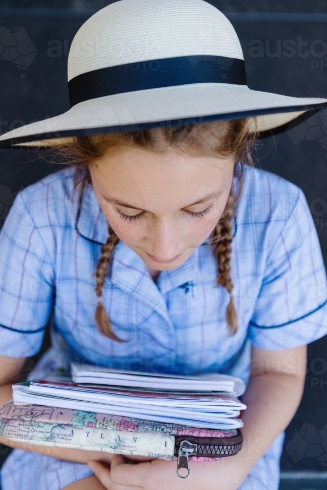 high school student with books - Australian Stock Image