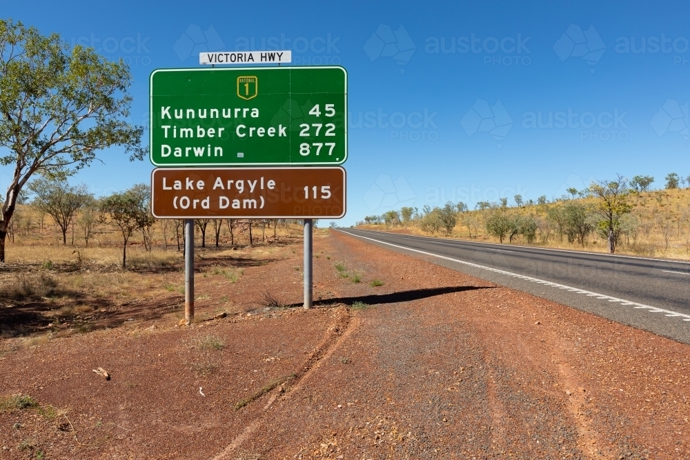 highway one in the Kimberley giving distances to Darwin and Kununurra - Australian Stock Image